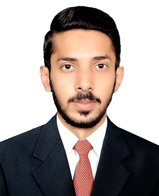 Portrait of Junaid Naeem in a suit